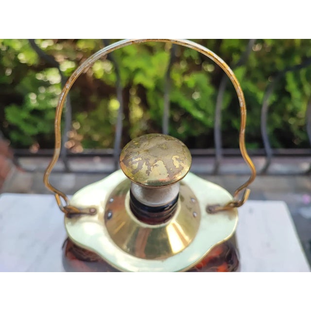 Glass carafe, brass-plated, 1960s, music box, the music box plays the melody of swan lake, dimensions: height 27.5 cm,...