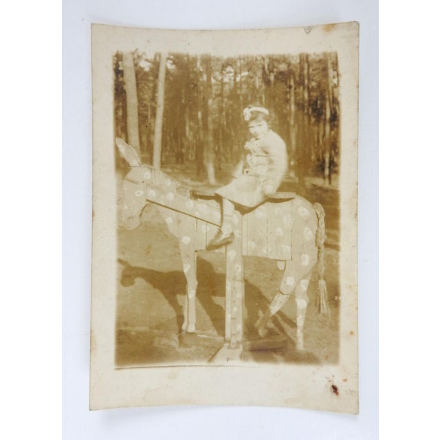 Portraiture Early 20th Century Girl on Wooden Donkey Sepia Snapshot Photograph For Sale - Image 3 of 3