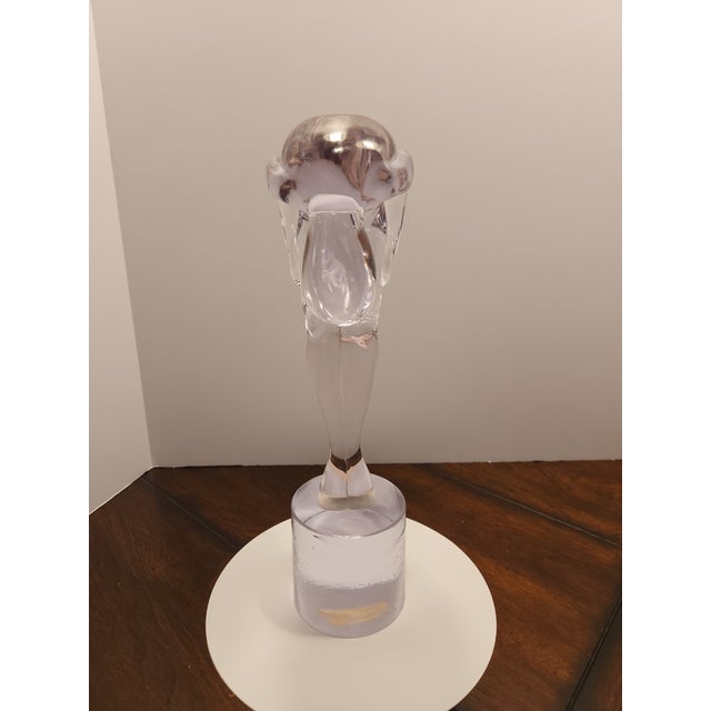 Elevate your space with this monumental and exceptionally elegant solid crystal abstract sculpture by Venetian master...