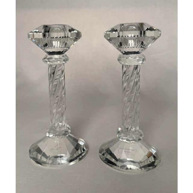 A twisted glass spiral-cut design adds depth and texture to the top crystal cut faceted, diamond-like shape candle cup and...
