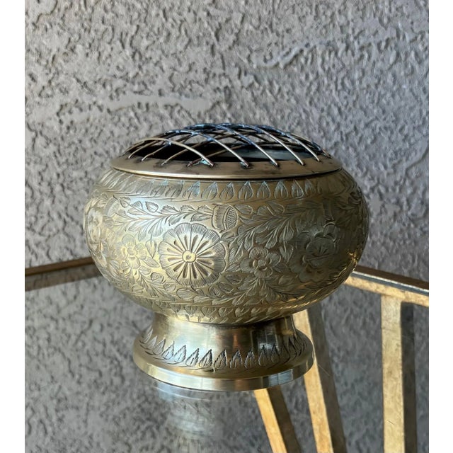 Excellent Pre-Owned Condition. This lovely to look at pedestal vessel is a beautifully engraved brass flower frog...