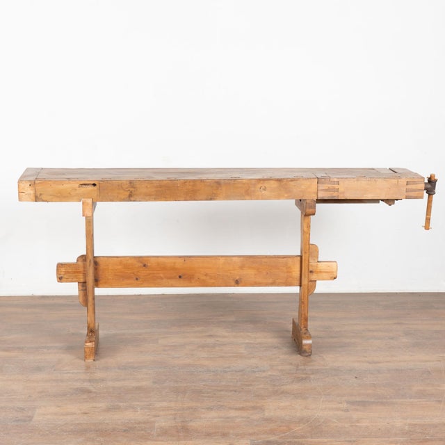 It is the years of constant use revealed in every ding and scratch that enrich the character of this carpenters' workbench...