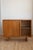 A simple sideboard from France. Singular Tambour style accordion door makes opening and closing easy and versatile. Great...