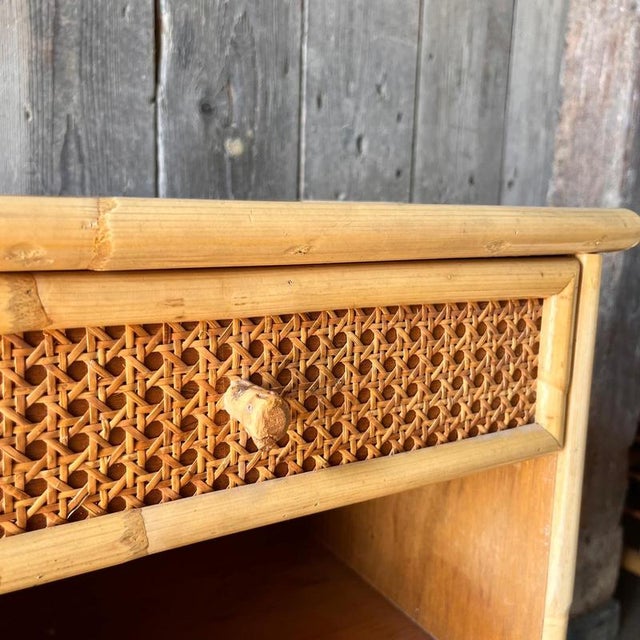 A pair of Cane Bedside cabinets with drawer and enclosed shelf Glass topped and bamboo drawer handle Dimensions: Height:...