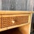 A pair of Cane Bedside cabinets with drawer and enclosed shelf Glass topped and bamboo drawer handle Dimensions: Height:...
