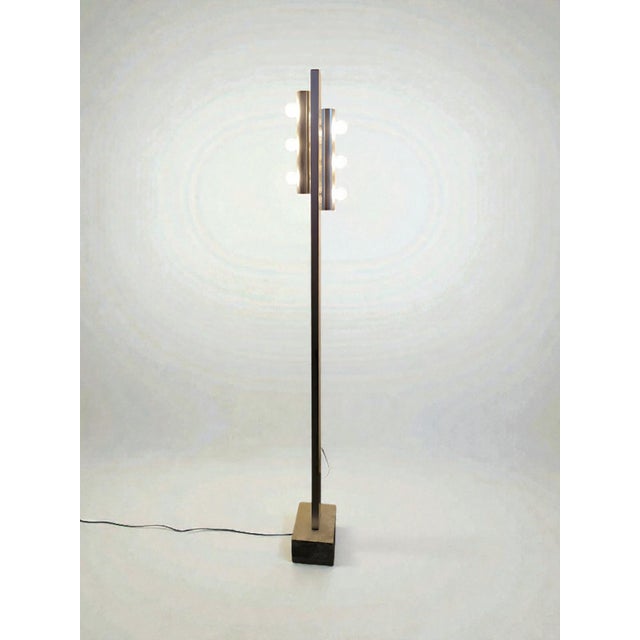 Six-light aluminum floor lamp with E14 fitting, travertine marble base, and original switch. In excellent condition. This...