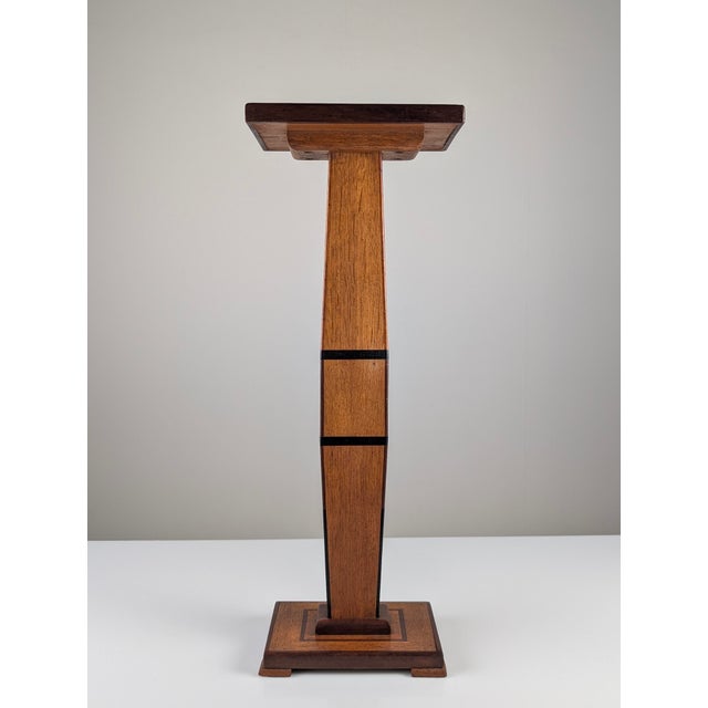 This architectural pedestal column reflects the European Art Deco movement of the 1920s. Constructed from solid wood and...