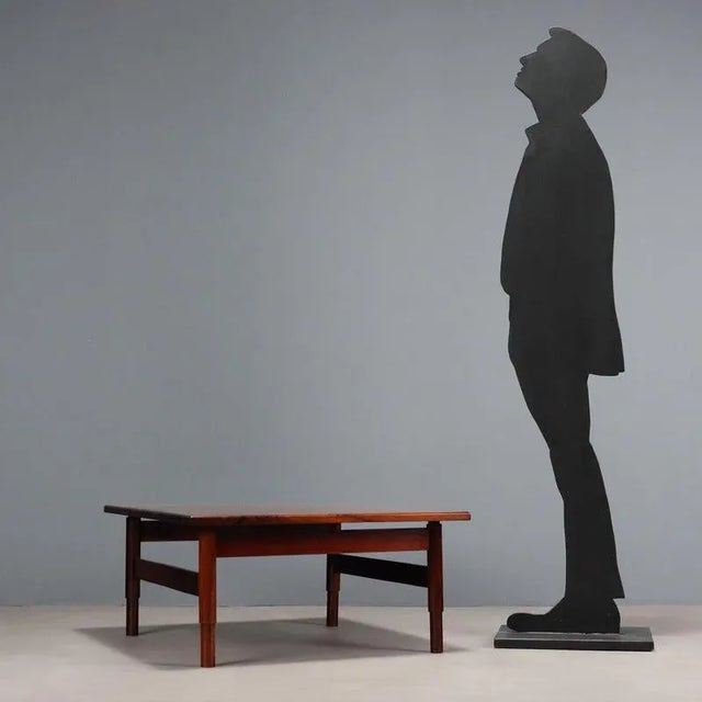 Vintage exotic wood veneer coffee table with a square top. Restored. This piece is attributed to the mentioned...