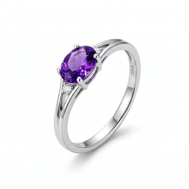 This elegant ring features a captivating Amethyst gemstone, admired for its rich violet hue and timeless appeal. Known as...