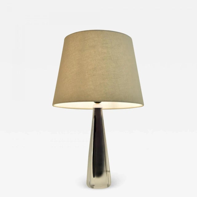 Rare pair purple core glass lamps, please see pictures where the glassfoot is lit and the beautiful purple core is...