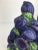 What a vivid topiary this is, depicting some very purple plums. Ceramic piece is accented with green leaves and presented...