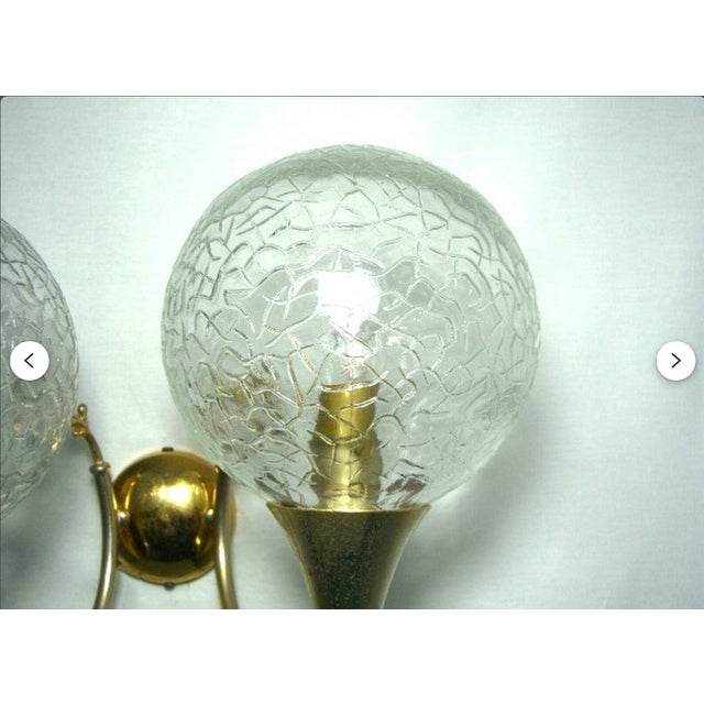 A most impressive pair of wall sconces, created in Germany in the 1980's, a most expressive Mid Century Modern design....