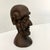 Vintage and Unusual Head sculpture in a heavy ironwood. Unsigned Size: 6" tall, 3.25" w, 4" d Condition: one area looks to...