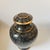 This elegant, baluster-shaped lidded jar is crafted in the traditional cloisonné enamel technique on a copper base. The...