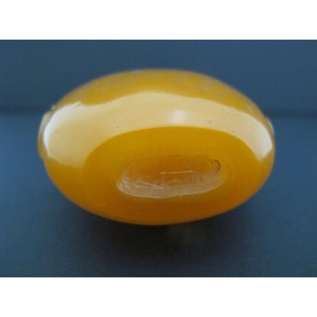 Orange Chinese Erotic Orange Engraved Mock Mask Ring Handle Snuff Bottle For Sale - Image 8 of 11
