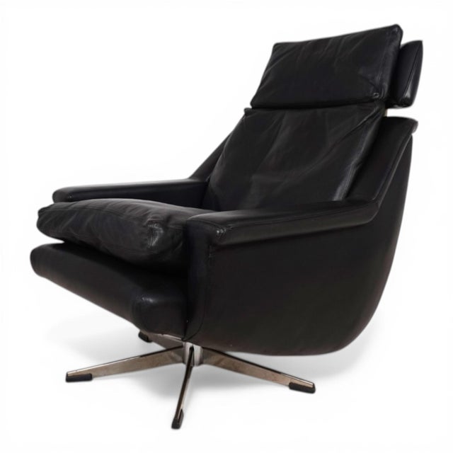The esa 802 armchair is an outstanding example of scandinavian mid-century design and was manufactured by the danish...