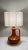 A large and very decorative French mid-century table lamp in a stunning glazed burnt orange ceramic with slight brown...