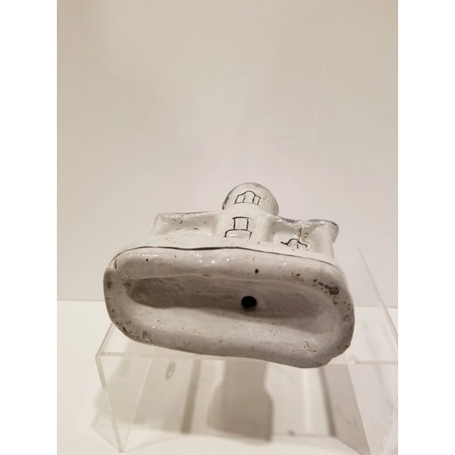 Unusual antique primitive cottage with salt glazed surface.