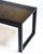 This custom handmade glass coffee table features a seamless, kiln cast 3/4″ thick bronze glass top. In low light, the...