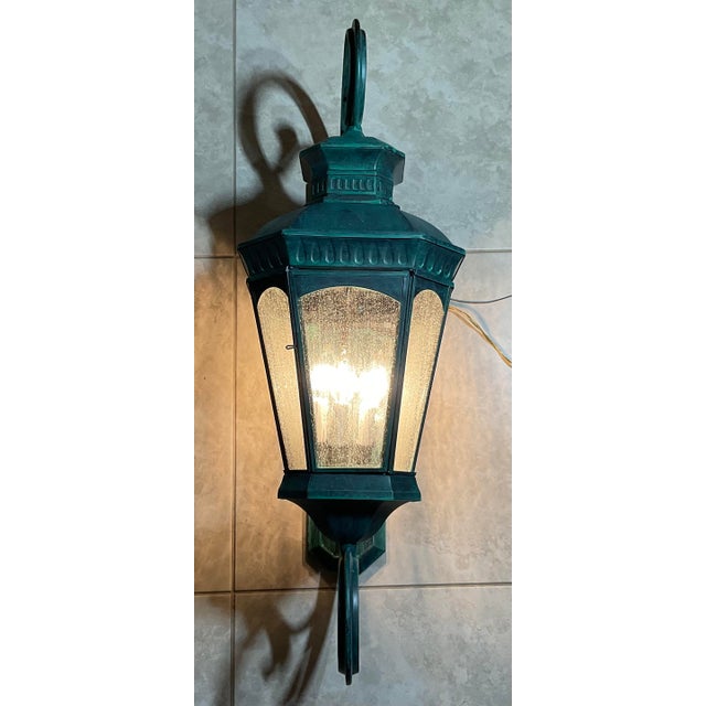 Elevate your home’s exterior or entryway with this striking, monumental brass and bronze outdoor wall lantern. Combining...