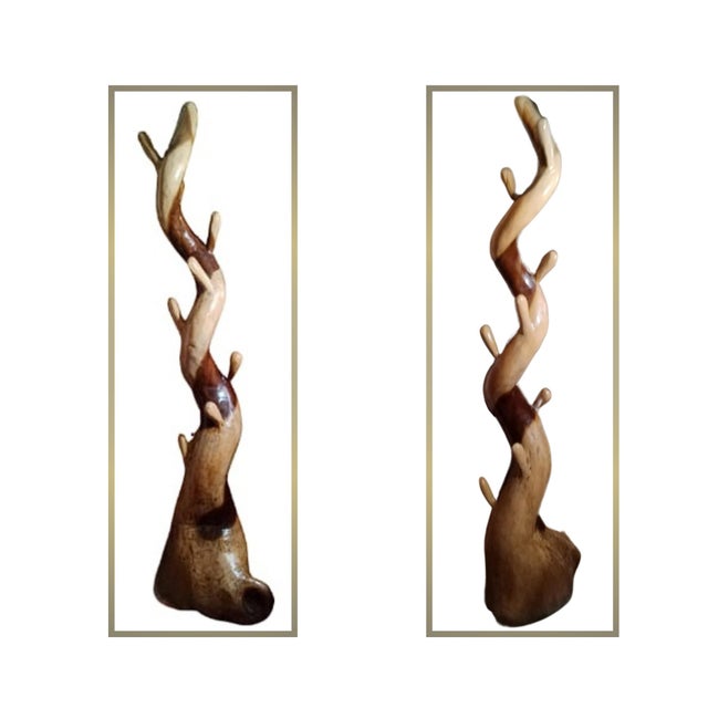 With over 2 meters in height, this sculptural coat rack, hand-carved from solid wood, is an icon of bohemian design....