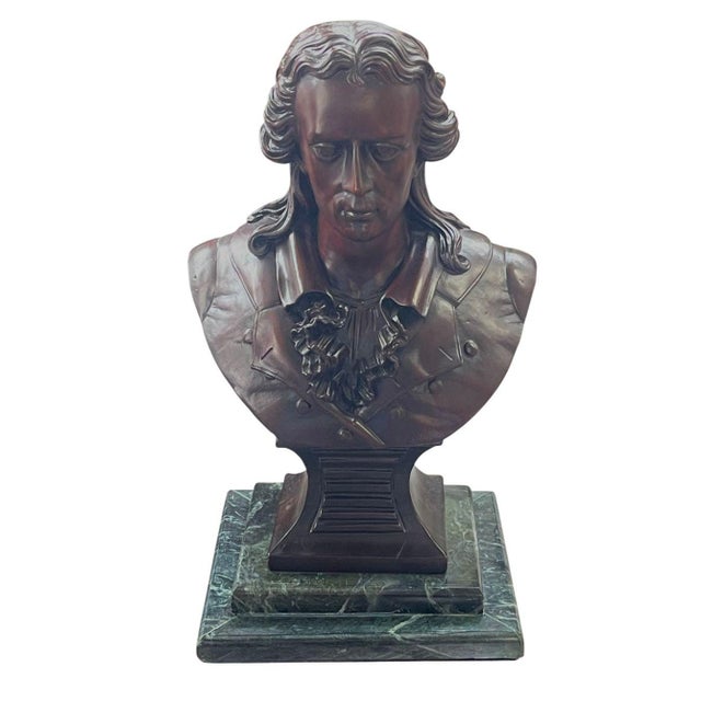 A refined set of three 20th-century carved Mahogany busts representing influential literary and historical figures (From...