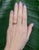 Two earth-mined diamonds run across this solid 14K yellow gold open band. The hardest natural material, diamond has...