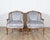 A graceful pair of Louis XV-style gondola armchairs from the 20th century, crafted in beechwood and newly upholstered for...