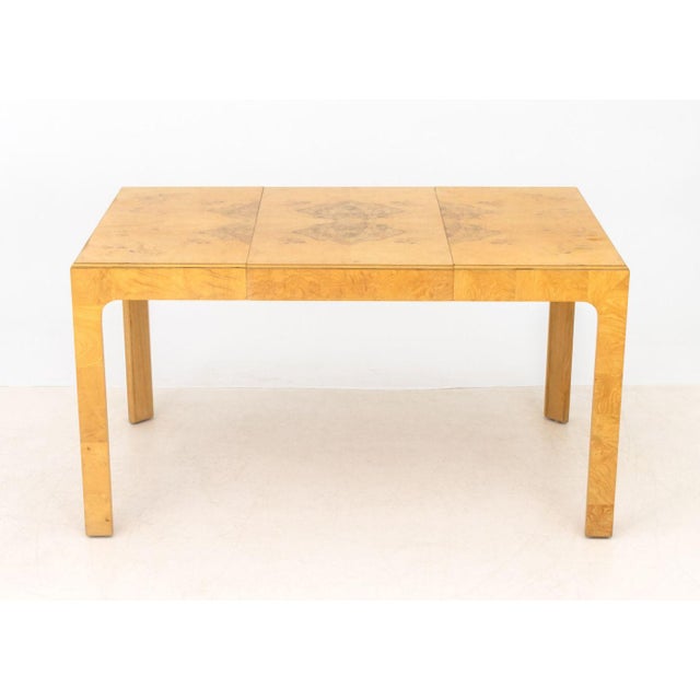 Modern Oyster Walnut Extending Parsons Dining Table, with one central leaf. 29.25" H x 54" W x 34" D. Provenance: From a...