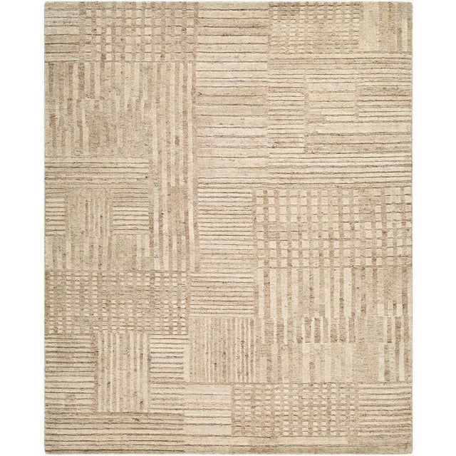 Introducing the Bergamo Collection's exquisite handmade rug, where minimalist modern design meets the luxurious texture of...
