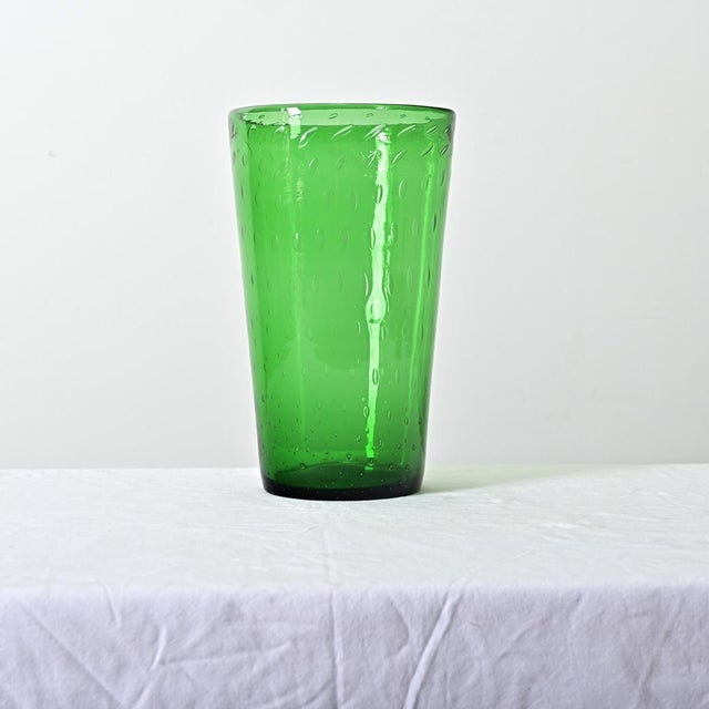 English, late 19th century green glass vase with bubbled or "bullicante" effect embedded in the glass. This large, conical...