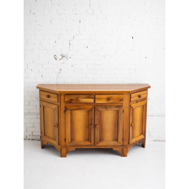 Mid-century blonde wood credenza, Italian made circa 1960s. Classic 19th century Tuscan silhouette with warm honey colored...