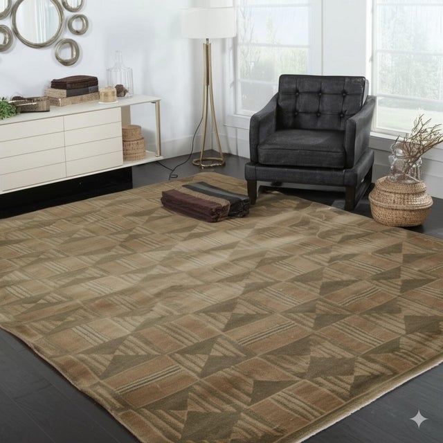 Sumptuous Giselle Brown Hand Knotted Wool Rug, Country of Origin: China. This striking piece presents a masterful study in...