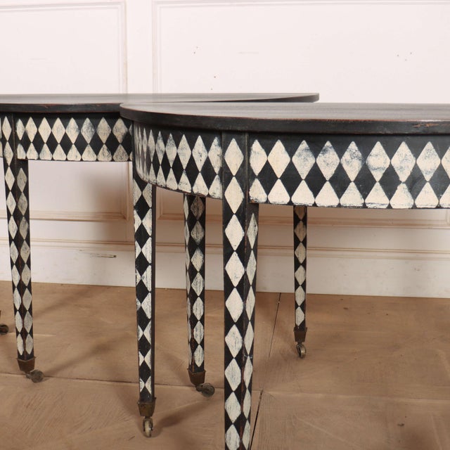 Interesting pair of 19th century English painted oak console tables. 1850. This piece is designed in the style of the...