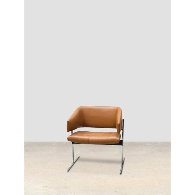 By jorge zalsupin, 1950 originally designed by jorge zalsupin in 1950, the senior armchair is simultaneously understated...