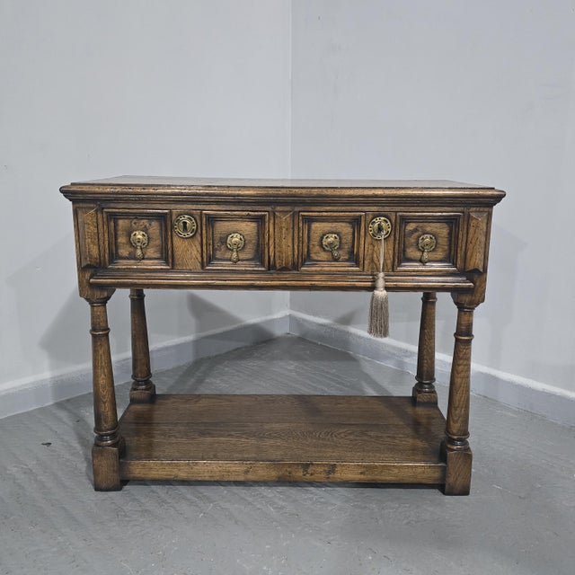 Excellent quality small solid oak two drawers sideboard with plank base, brass handles and working key, excellent overall...