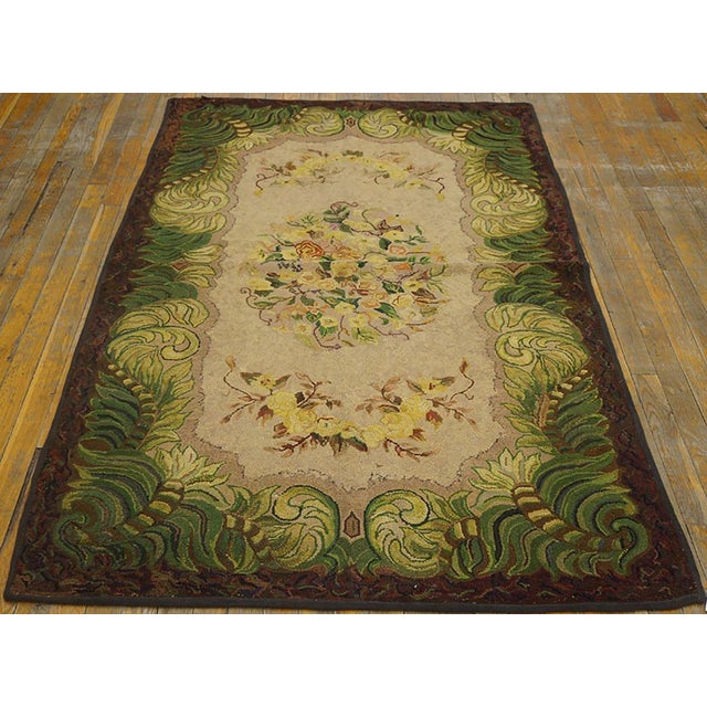 Antique American Hooked rug, size: 3'11" x 6'4". American Hooked Rugs Contemporary American Hooked carpet utilizing strips...