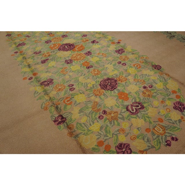 Antique American hooked rug, size: 12'0" x 19'10".