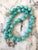 Lovely turquoise beaded necklace with gold tone spacers designed by Matthew Izzo