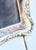 Sterling Silver frame from England with velvet back and brace. Faced with glass, stands vertical. The measurements are...