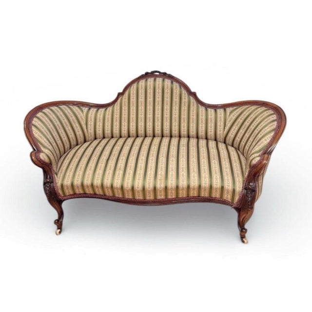 Victorian Walnut Framed Sofa, Cabriole Legs, White Castors Size :- 171 cms wide, 88 cms high. Seat height approximately 43...