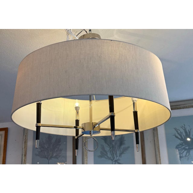 Design Plus Gallery presents the Ventana Chandelier from Jonathan Adler. This light fitting is inviting and blends...