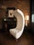 Dramatic matching pair of H-Studio by Shlomi Haziza attributed sculptural high-back lounge chairs, featuring exaggerated...