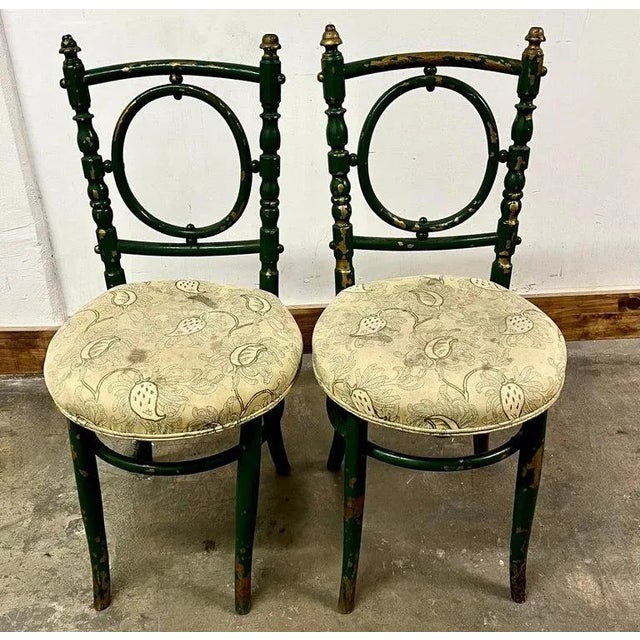 Pair of wonderfully designed wooden bentwood chairs with gilt details. The chairs are original. The design is unique and...
