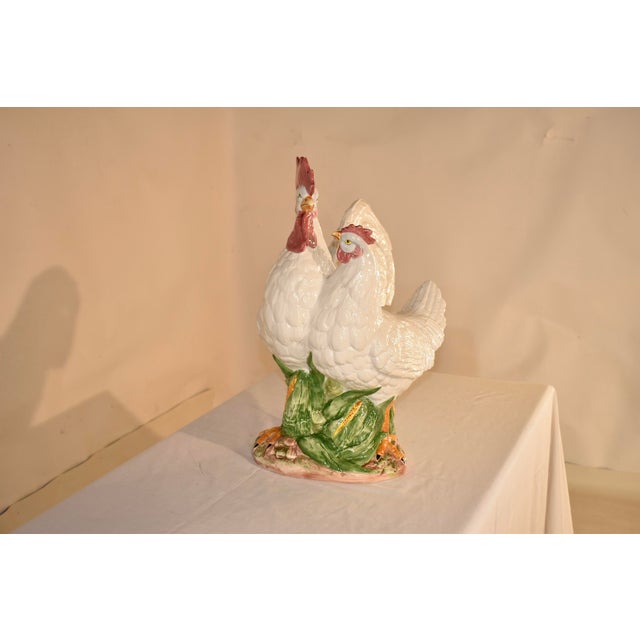 Vintage Vietri ceramic rooster and hen sculpture which has been hand painted and glazed. This piece was made by Vietri in...
