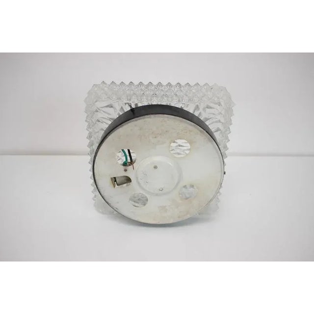 Vintage wall/ceiling lamp, made in the 1970s, in former Czechoslovakia. Made of metal and glass. Repolished, cleaned,...