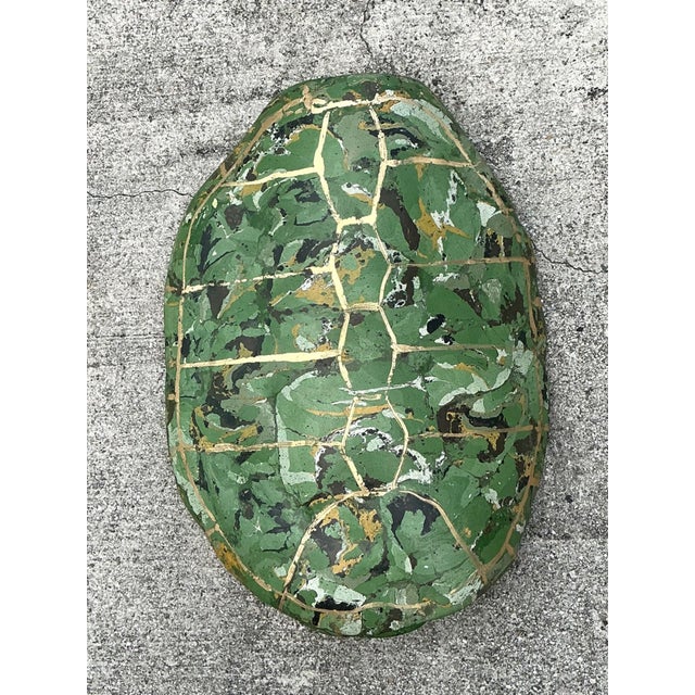 This evocative vintage Italian turtle shell is a compelling example of traditional scagliola craftsmanship, a technique...