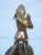 John Terken bronze of mermaid with conch shell. Nude female figural mermaid lifting shell to ear. Fine bronze from the...