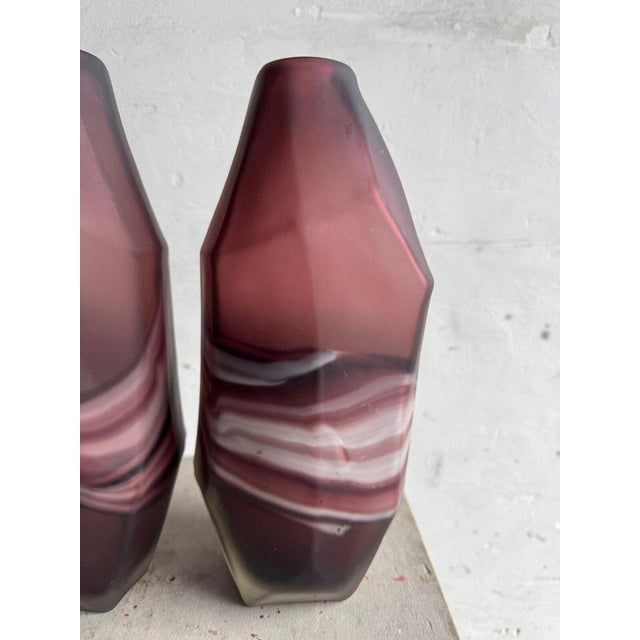 Amethyst and White Swirl Glass Vase Set This striking set of glass vases features a beautiful blend of amethyst and white...