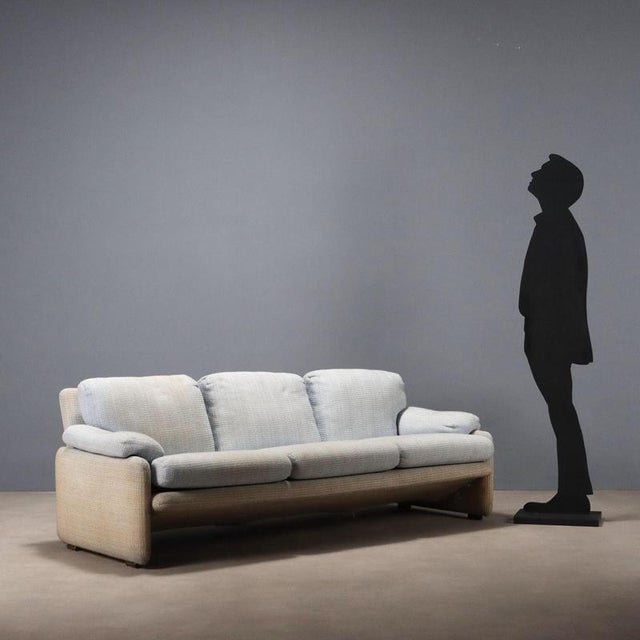 Vintage three-seater sofa with foam padding and fabric upholstery; the seat can be reupholstered. This piece is attributed...